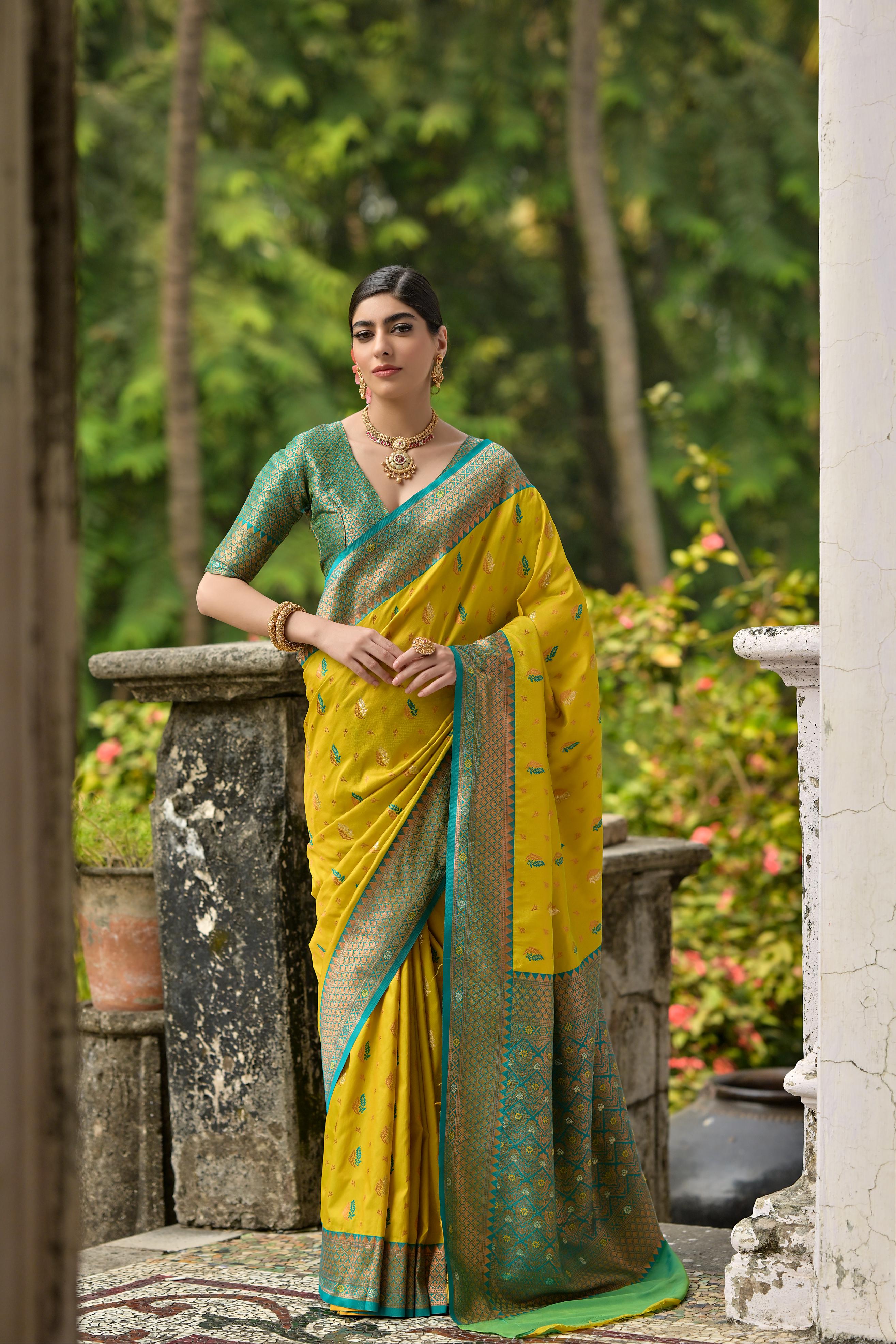 Luxurious Yellow Woven Banarasi Saree with Intricate Zari Motifs