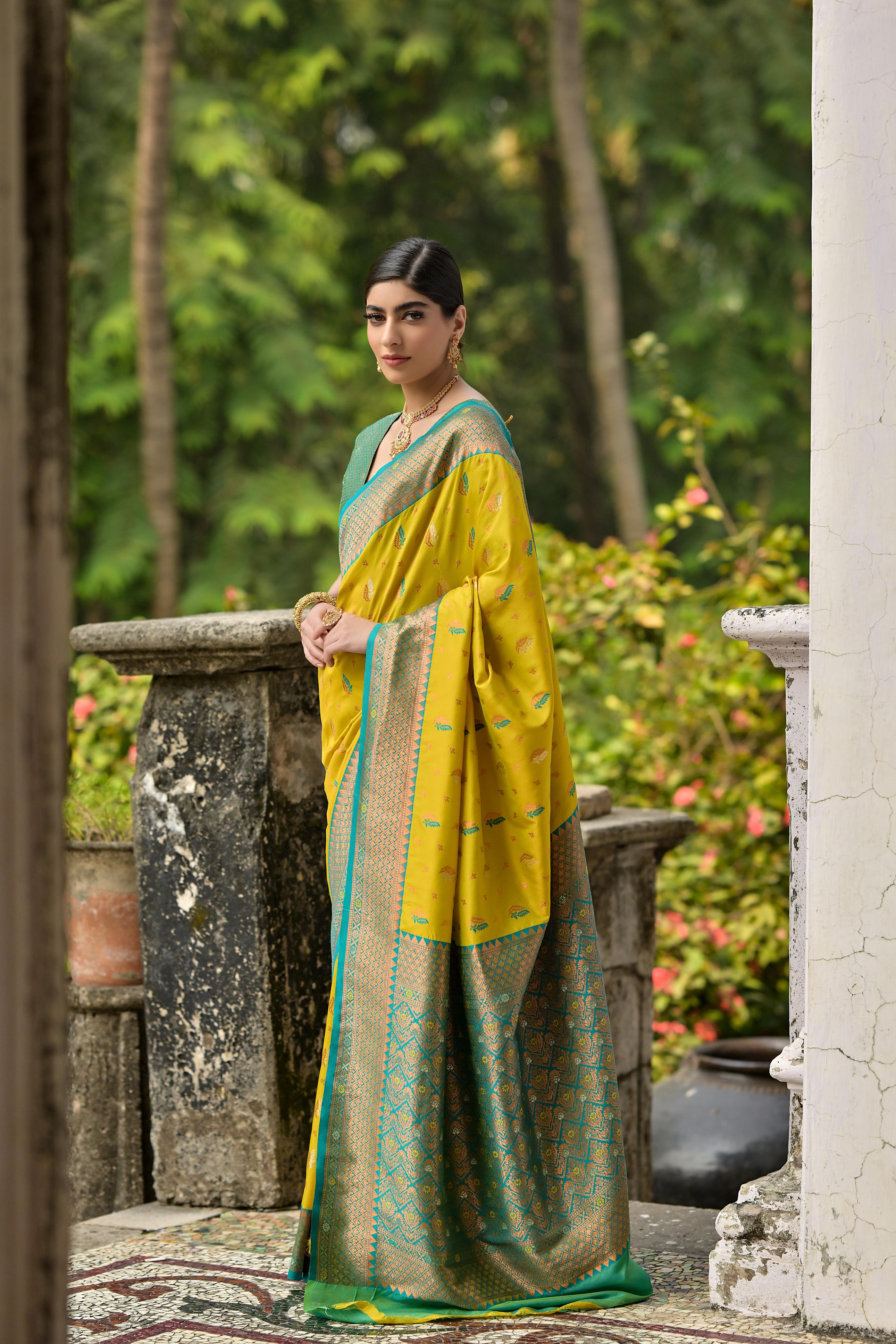 Luxurious Yellow Woven Banarasi Saree with Intricate Zari Motifs