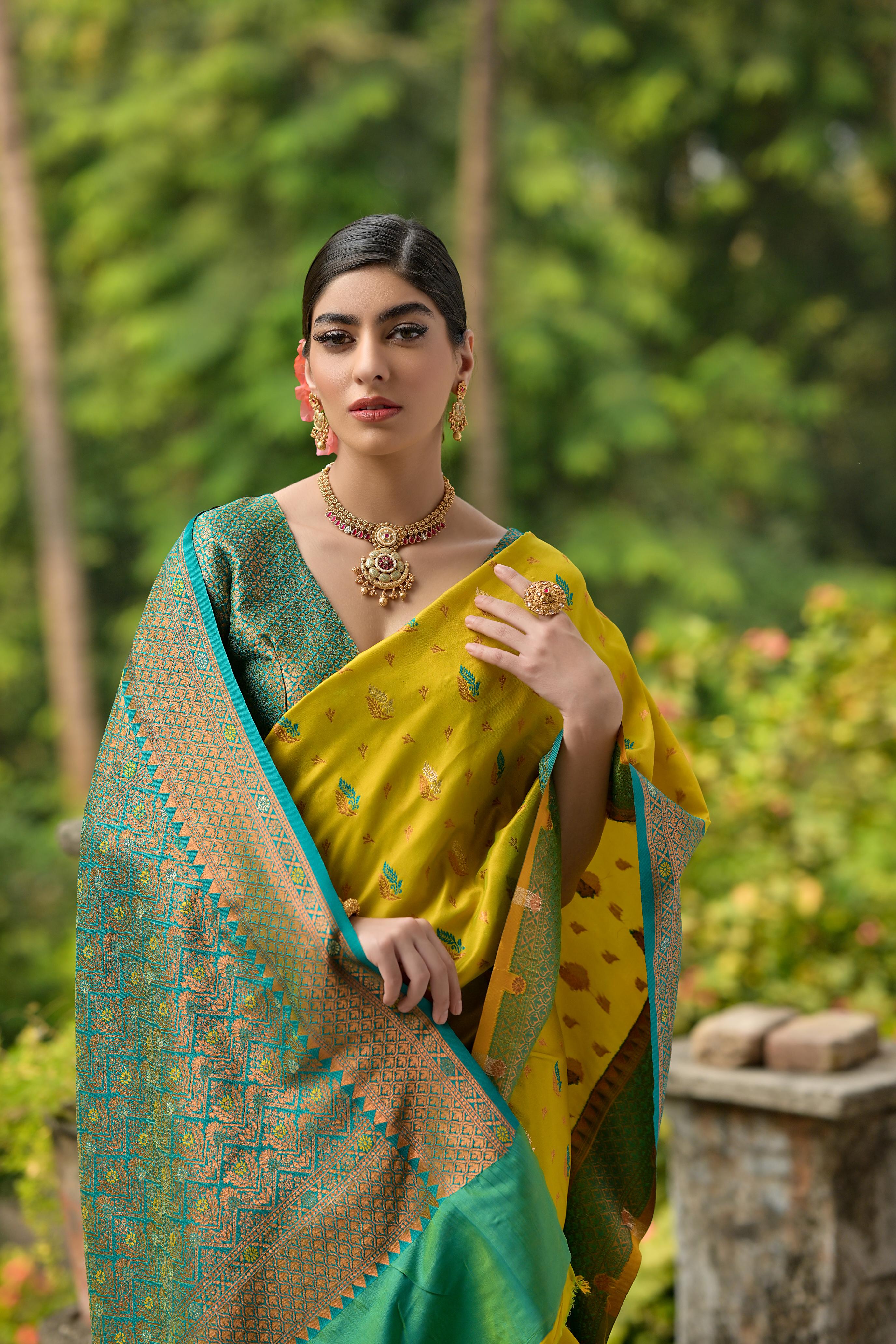 Luxurious Yellow Woven Banarasi Saree with Intricate Zari Motifs