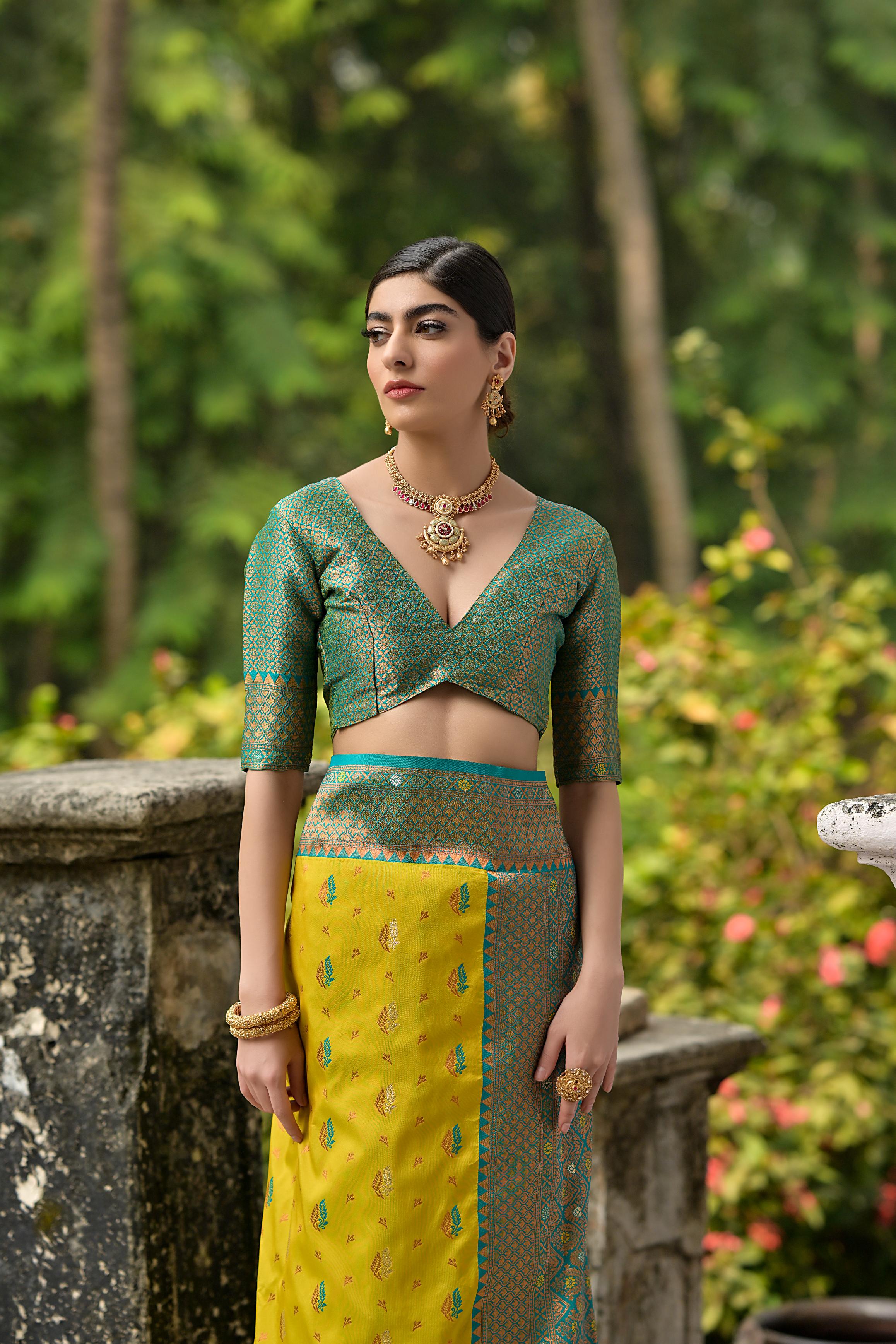 Luxurious Yellow Woven Banarasi Saree with Intricate Zari Motifs