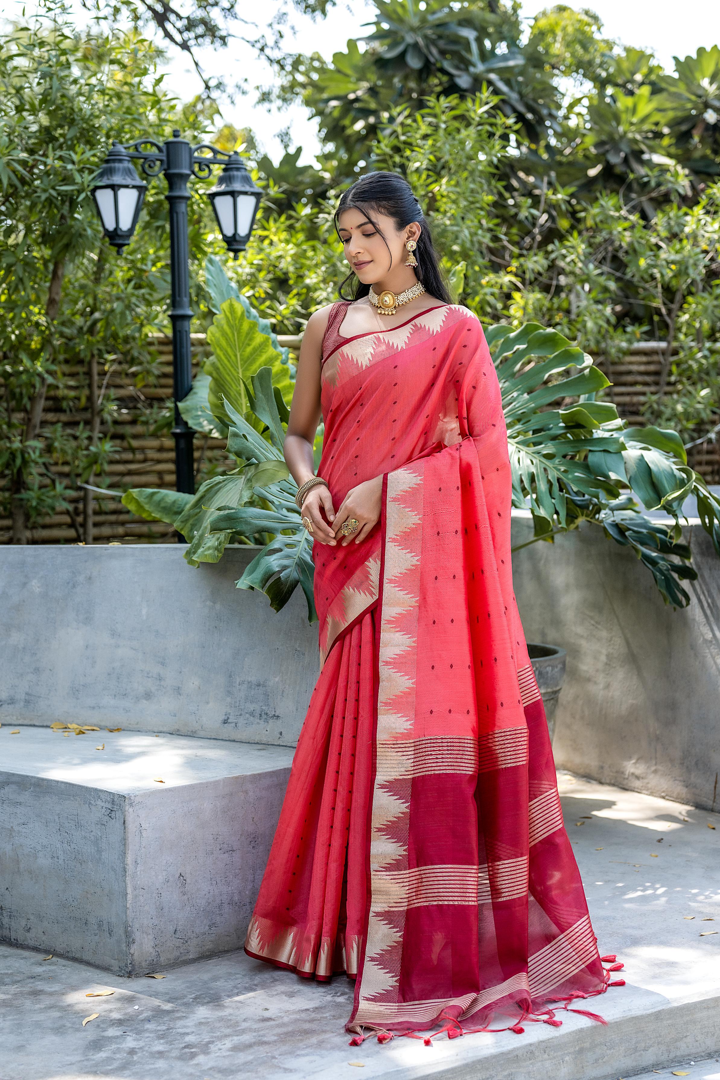 Elegant Peach & Maroon Zari Woven Saree