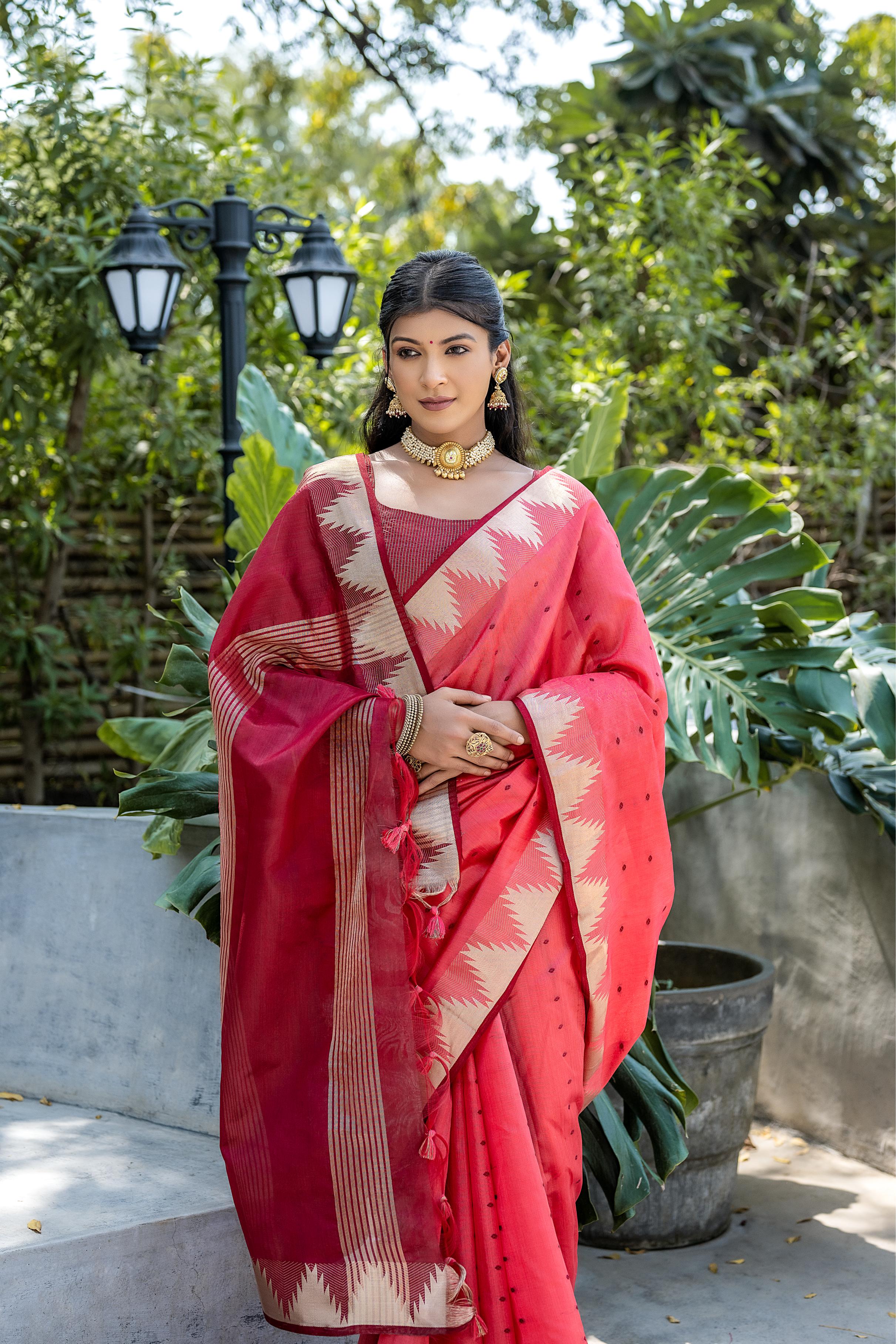 Elegant Peach & Maroon Zari Woven Saree