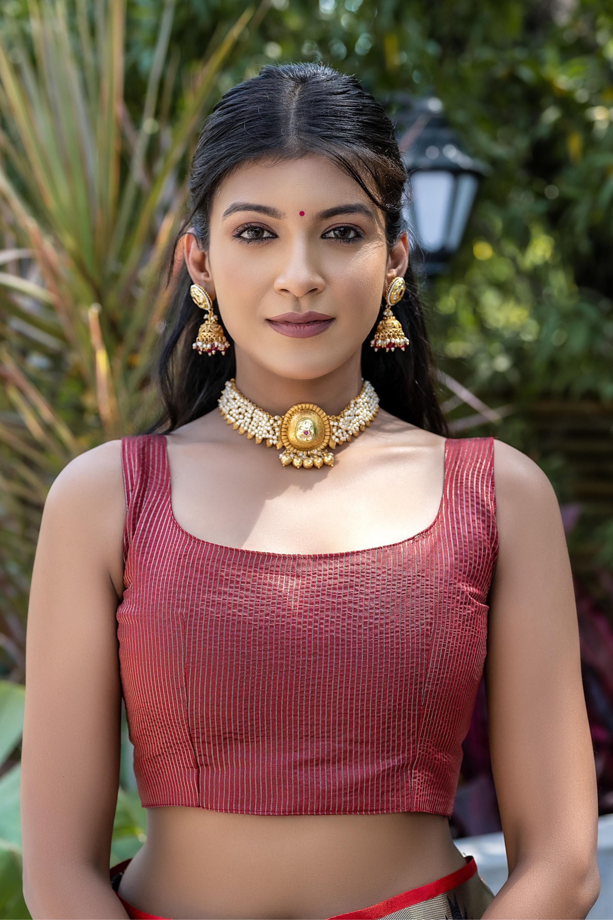 Elegant Peach & Maroon Zari Woven Saree