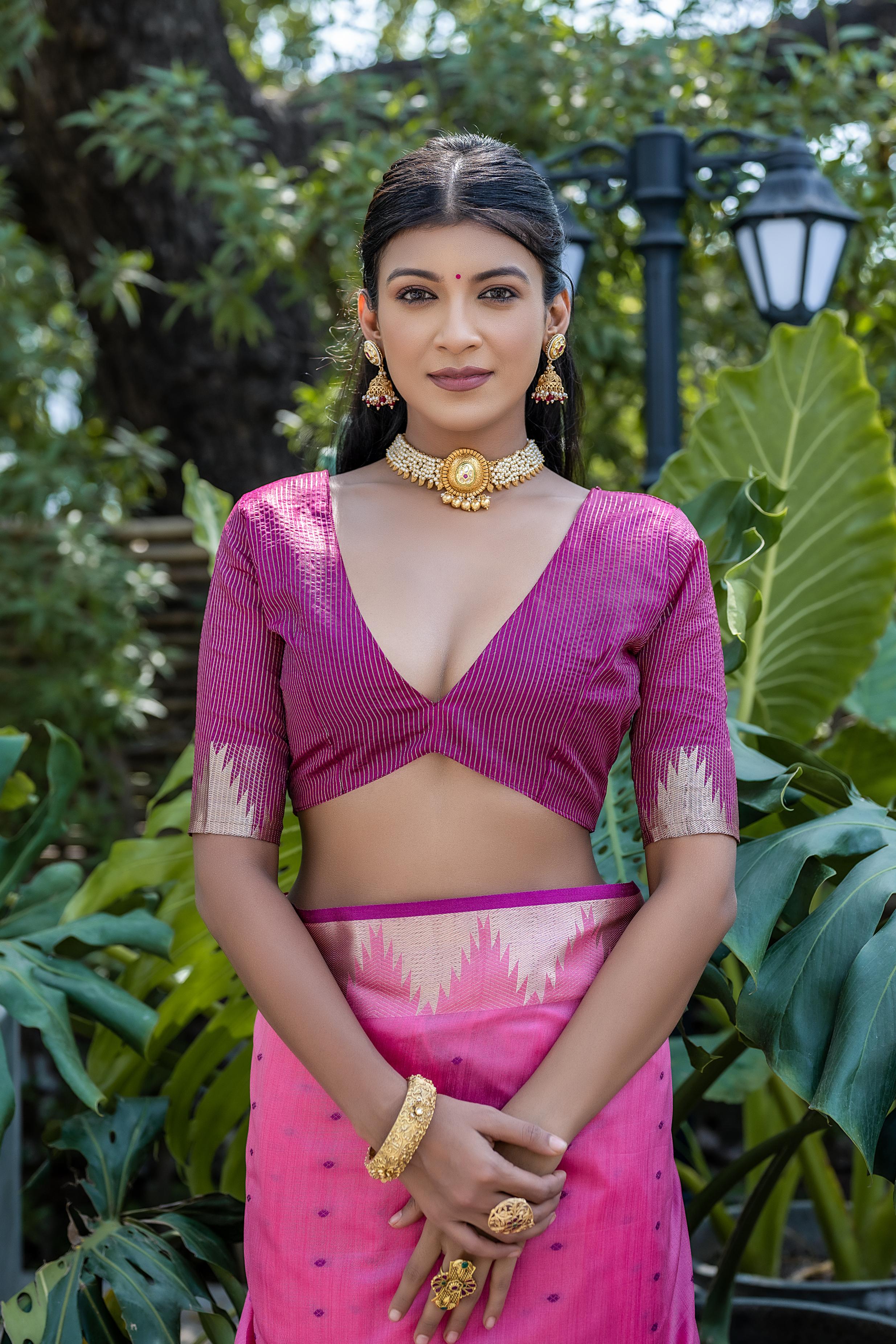 Elegant Pink Zari Weave Silk Saree with Temple Border