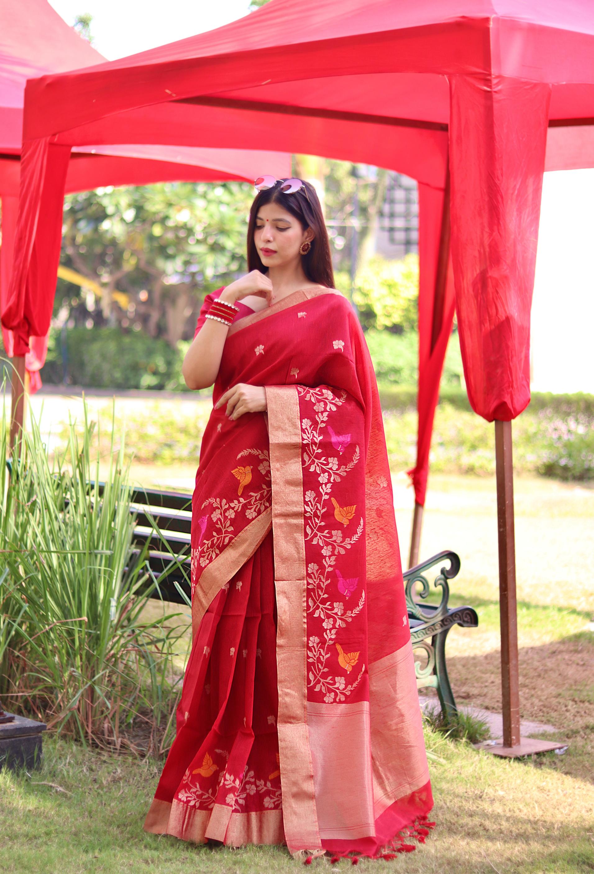 Traditional Red Linen Saree with Rich Floral Design & Contrast Border
