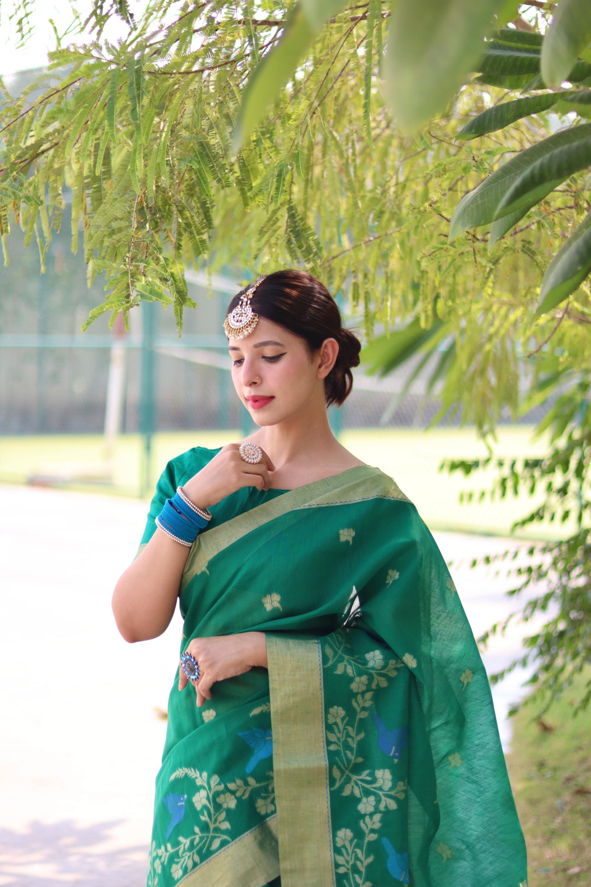 Traditional Green Linen Silk Saree with Golden Zari Border